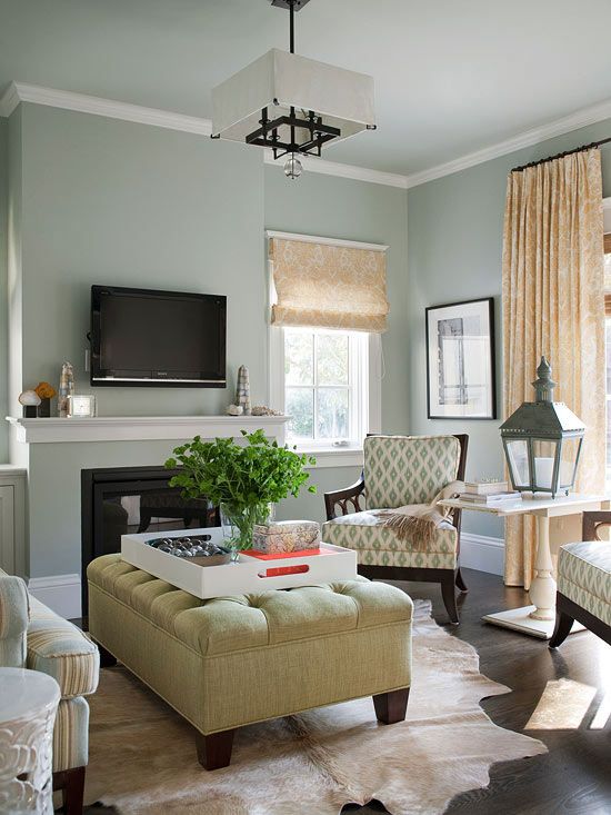 Comfy, Yet Chic:: The small living room at the front of the house functions  as a grown-up space for entertaining. The colors here mimic those used in  the 